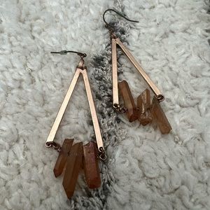 Rose gold plated metal.  3 Crystal drops.